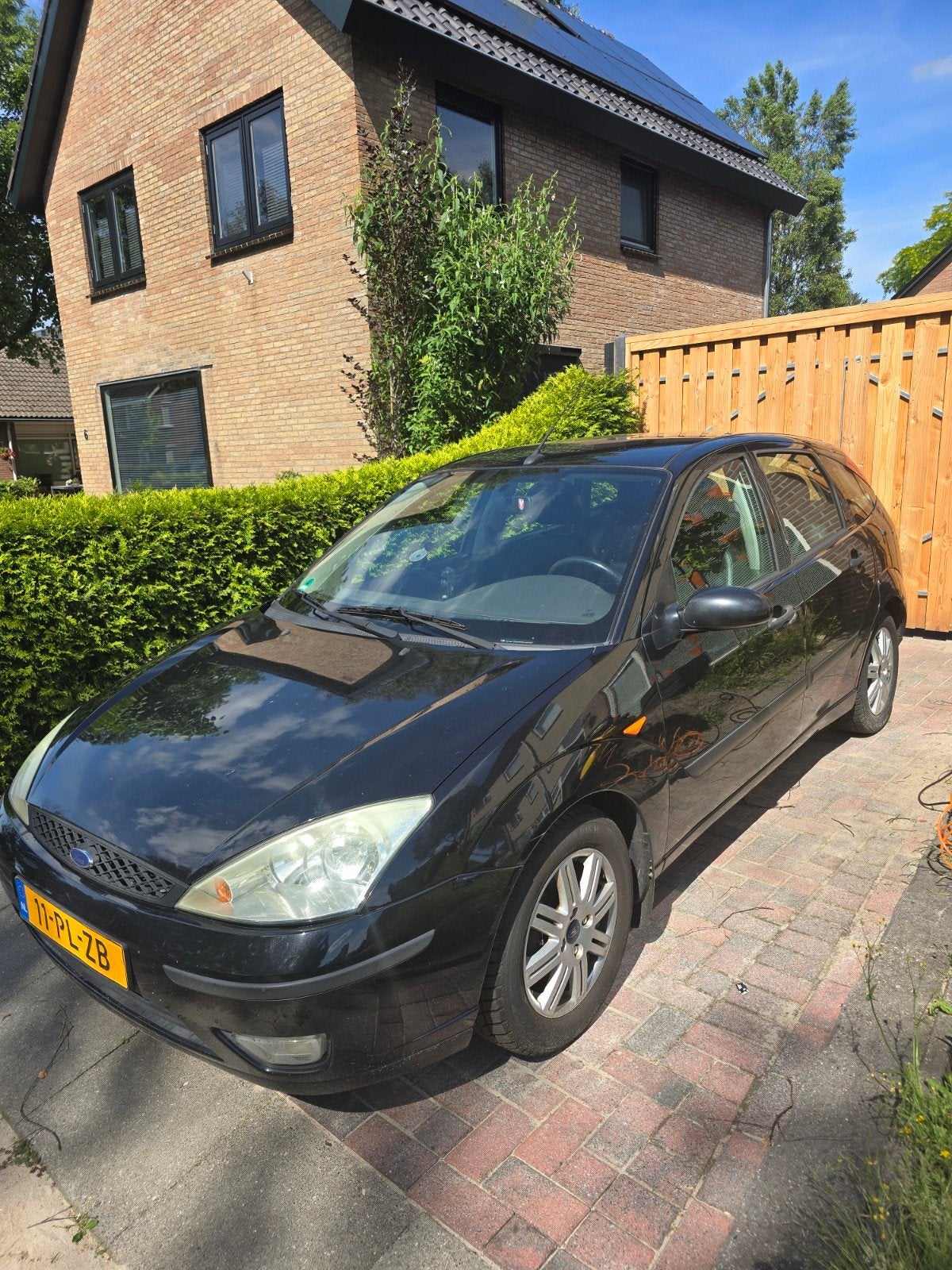 Ford Focus 1.6 I Ghia 2004 Zwart, 1596 cc, 15 km/l, 4 cilinders, 100 pk