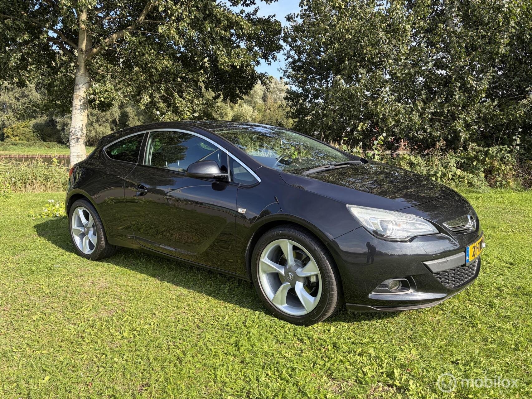 Opel Astra GTC 1.4 Turbo Sport, Auto's, Voorwielaandrijving, Gebruikt, 4 cilinders, 700 kg