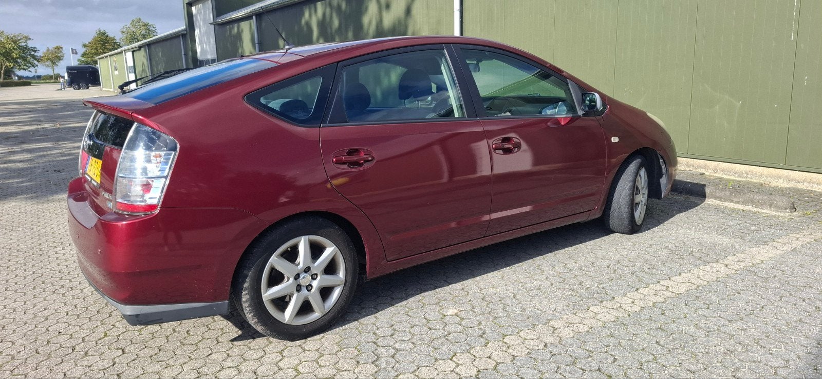Toyota Prius 1.5 HSD 2005 Rood, 1497 cc, 4 cilinders, 23 km/l, Origineel Nederlands
