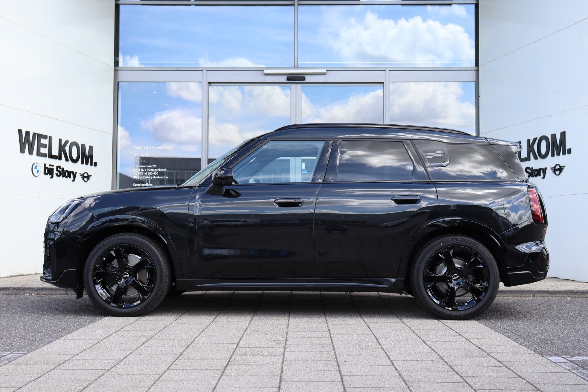 MINI Countryman C Automaat / John Cooper Works / Pakket L /, Met garantie (alle), Leder en Stof, Zwart, Origineel Nederlands