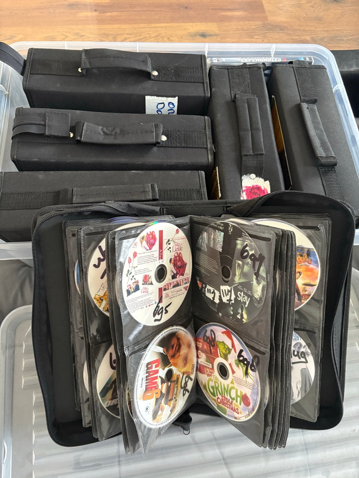 Grote collectie DVD films in handige opbergmappen, Alle leeftijden, Ophalen, Gebruikt
