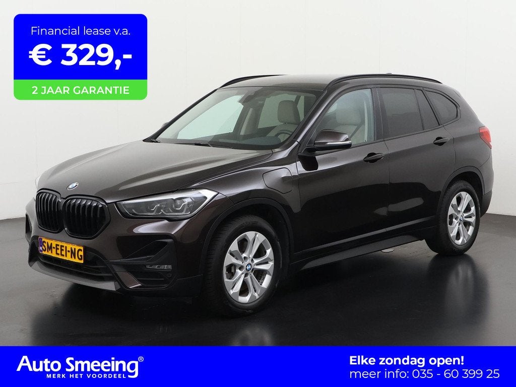 BMW X1 xDrive25e Executive | Camera | Leder | Elektr achterk, Auto's, BMW, 12 maanden, Gebruikt, Zwart, Plug-in hybride
