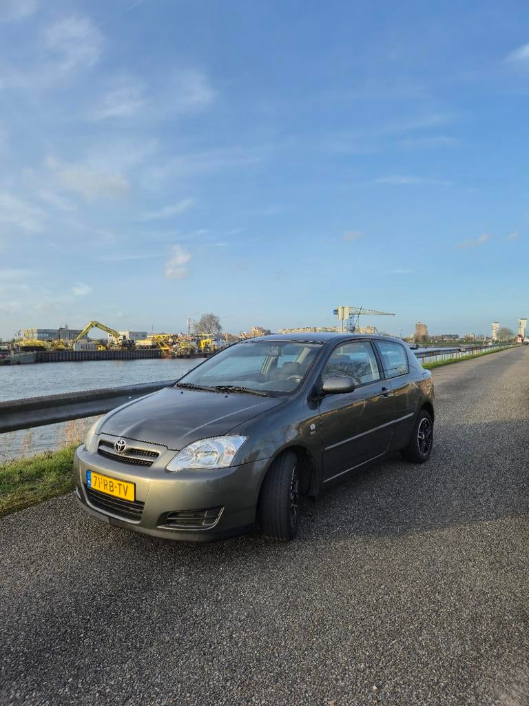 Toyota Corolla 1.4 Vvt-i 3DR Linea Terra 2005 Grijs, Auto's, Toyota, Particulier, Corolla, Benzine, C, Hatchback, Handgeschakeld