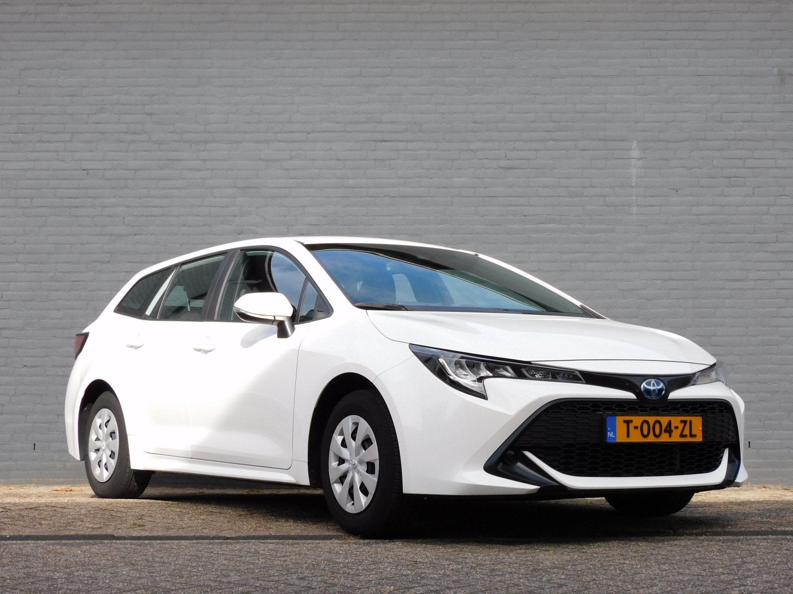 Toyota Corolla Touring Sports 1.8 Hybrid Comfort 1e EIGENAAR, Auto's, Gebruikt, 4 cilinders, Corolla, Wit