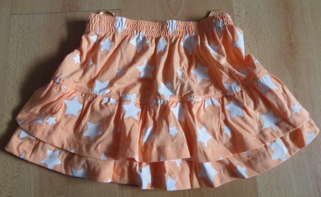 NIEUW: Katoenen oranje strokenrok met sterren maat 122, Ophalen of Verzenden, Nieuw, Meisje, Jurk of Rok