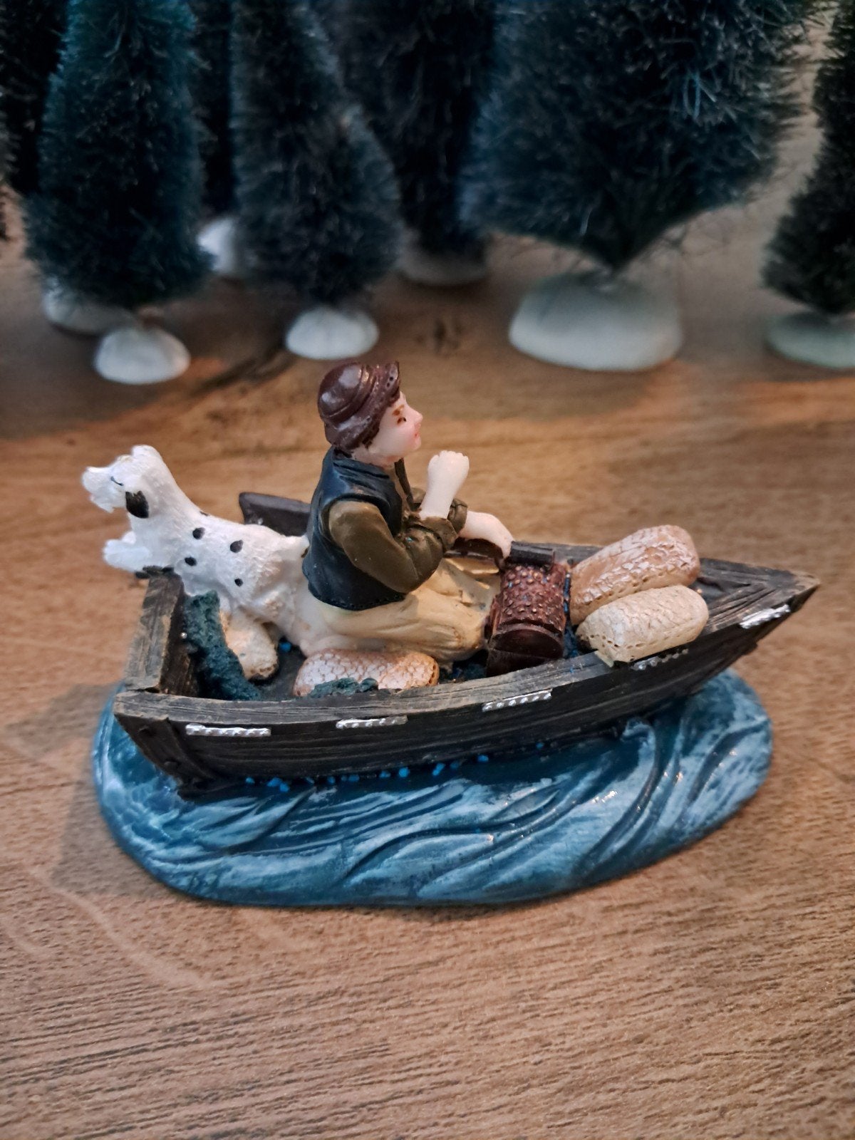 intratuin man met hond in een boot, Ophalen