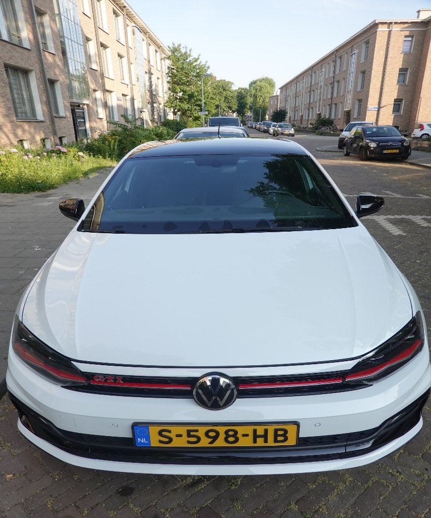 Volkswagen Polo 2.0 TSI 200pk 6-DSG 2021 Wit, Auto's, Volkswagen, Stof, 4 cilinders, 1984 cc, Multifunctioneel stuurwiel