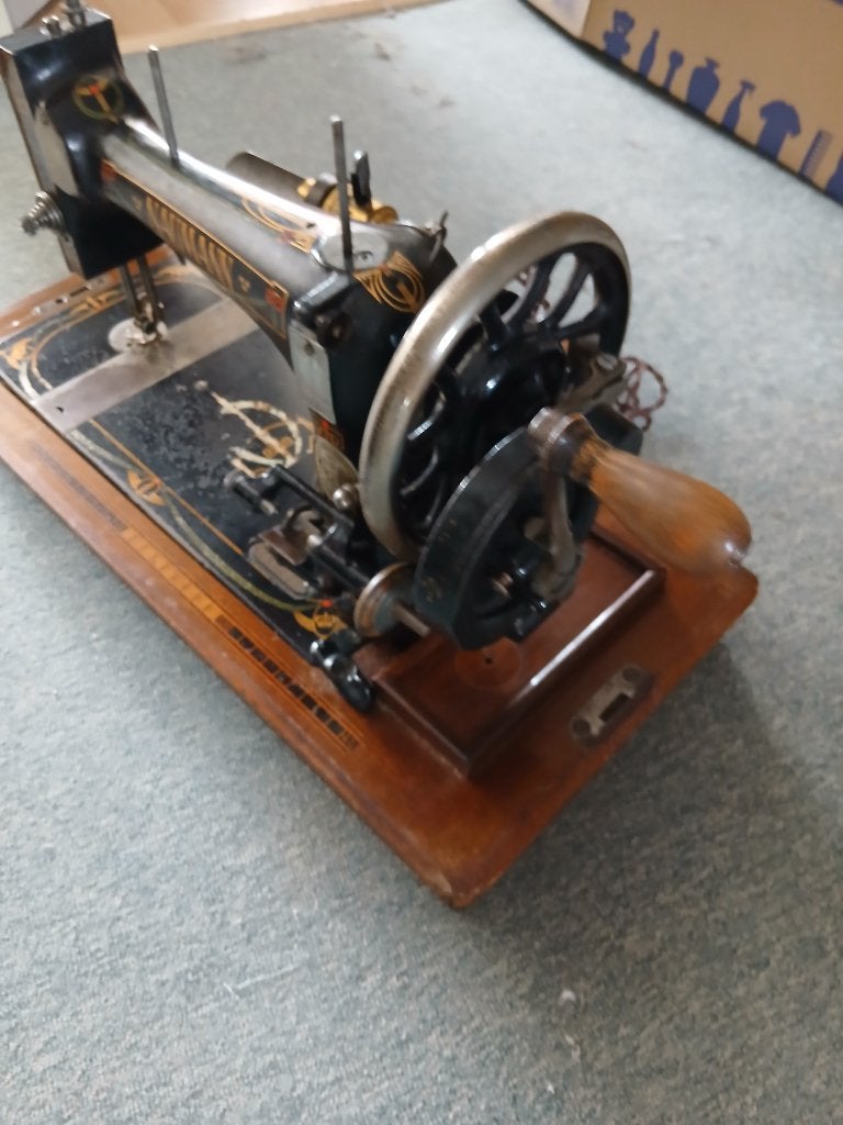 antieke naaimachine, Ophalen