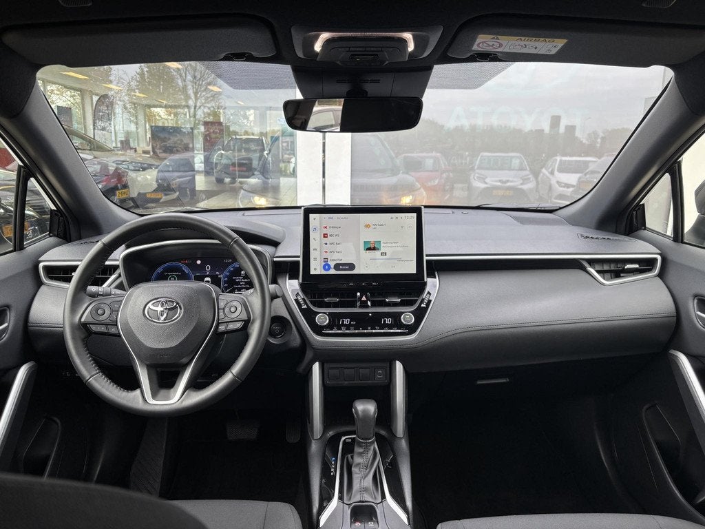 Toyota Corolla Cross Hybrid 140 Active Apple Carplay/Android, Auto's, Toyota, Stof, Gebruikt, Zwart, Origineel Nederlands