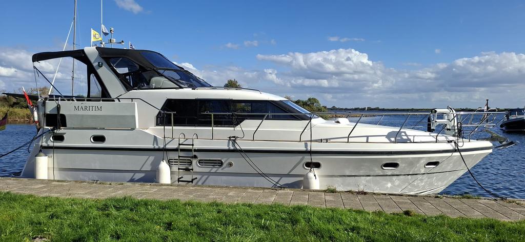 zeer mooie polyester Neptunus 108 express twin motoryacht ., Keuken, Ophalen of Verzenden, Zo goed als nieuw, Polyester