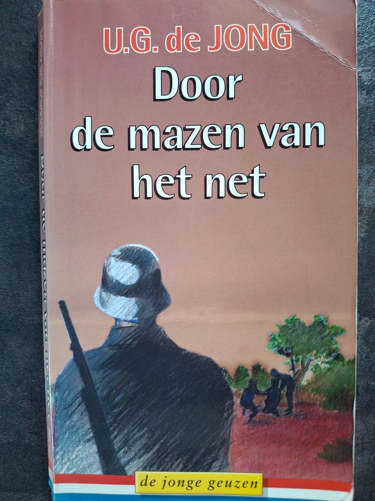 U.G. de Jong Door de mazen van het net De Jonge Geuzen SS, Boeken, Ophalen of Verzenden, Gelezen, U.G. de Jong
