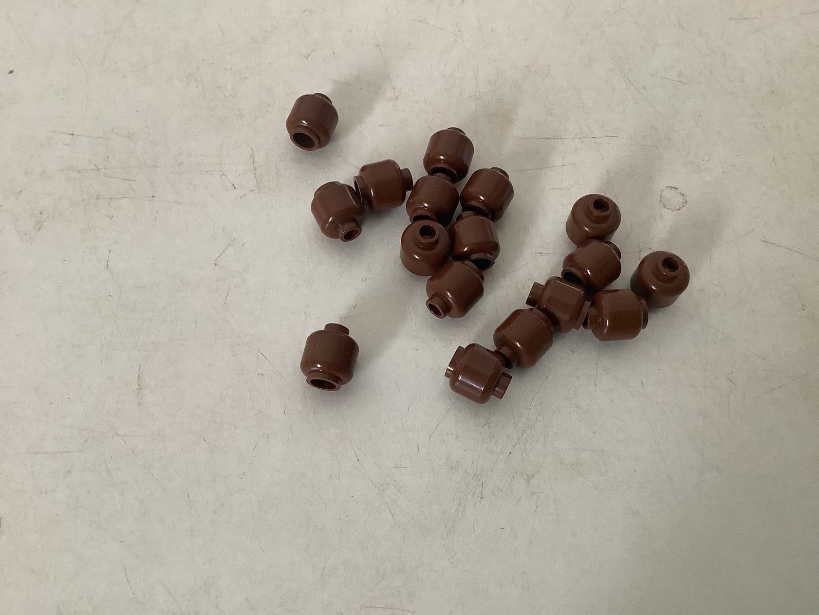 Lego minifiguur hoofd onbewerkt bruin (1), Kinderen en Baby's, Speelgoed | Duplo en Lego, Ophalen of Verzenden, Gebruikt, Losse stenen