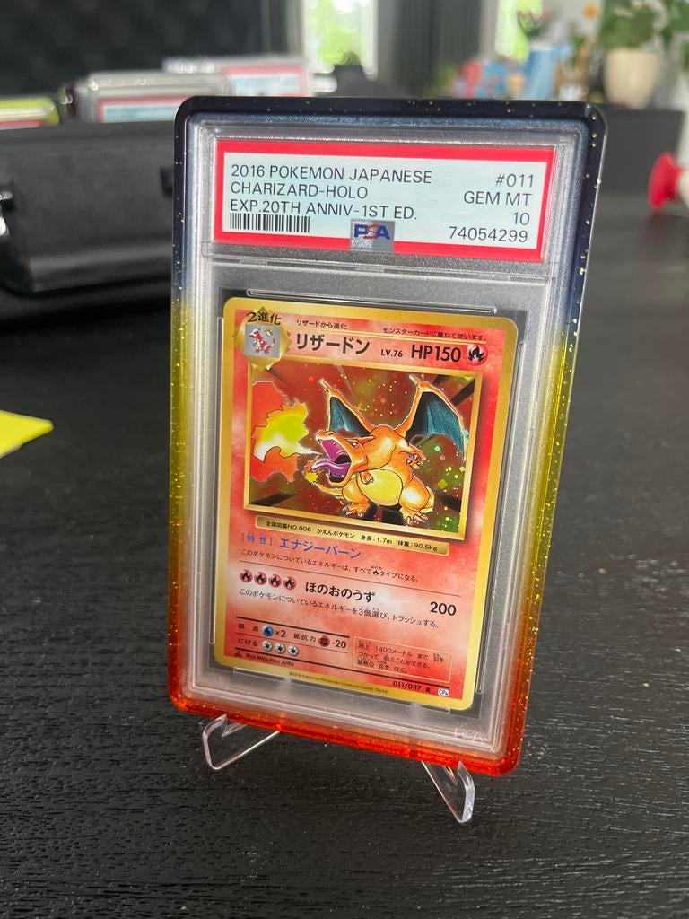 2016 Japanse Charizard Holo PSA 10 GEM MT 20th Anniv, Hobby en Vrije tijd, Verzamelkaartspellen | Pokémon, Ophalen of Verzenden