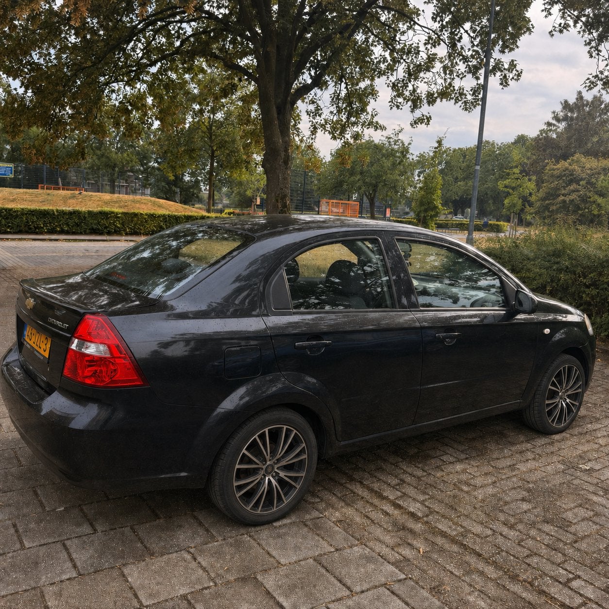 Chevrolet Aveo 1.4 | 144.000 km | schakelt perfect | CarPlay, Auto's, Voorwielaandrijving, 4 cilinders, Zwart, Origineel Nederlands