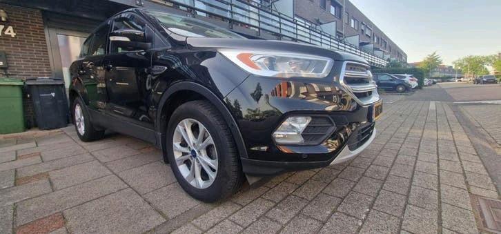 Ford Kuga 1.5 150 PK Titanium Navigatie Camera Keyless  Crui, Auto's, Ford, 1498 cc, 4 cilinders, 2000 kg, Leder en Stof