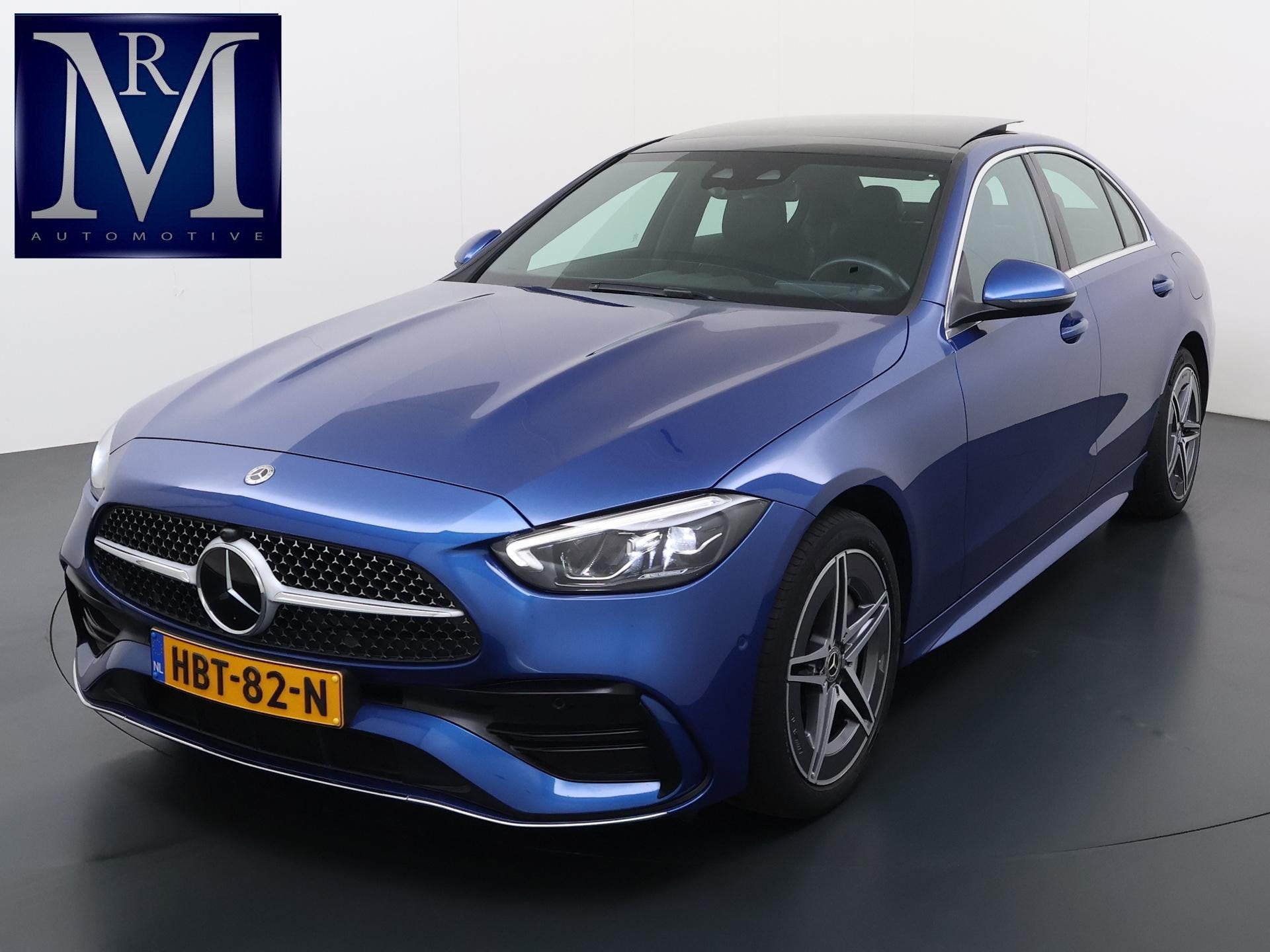 Mercedes-Benz C-klasse 300 e AMG Line Limited PHEV | PANORAM, Auto's, Achterwielaandrijving, 4 cilinders, Blauw, Leder en Stof