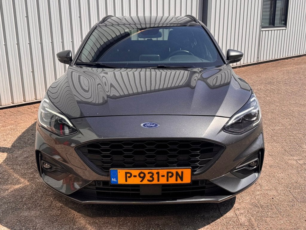 Ford Focus 1.0 EcoBoost Hybrid ST Line Camera / 18 inch / Na, Auto's, Ford, Gebruikt, Zwart, Origineel Nederlands, 19 km/l