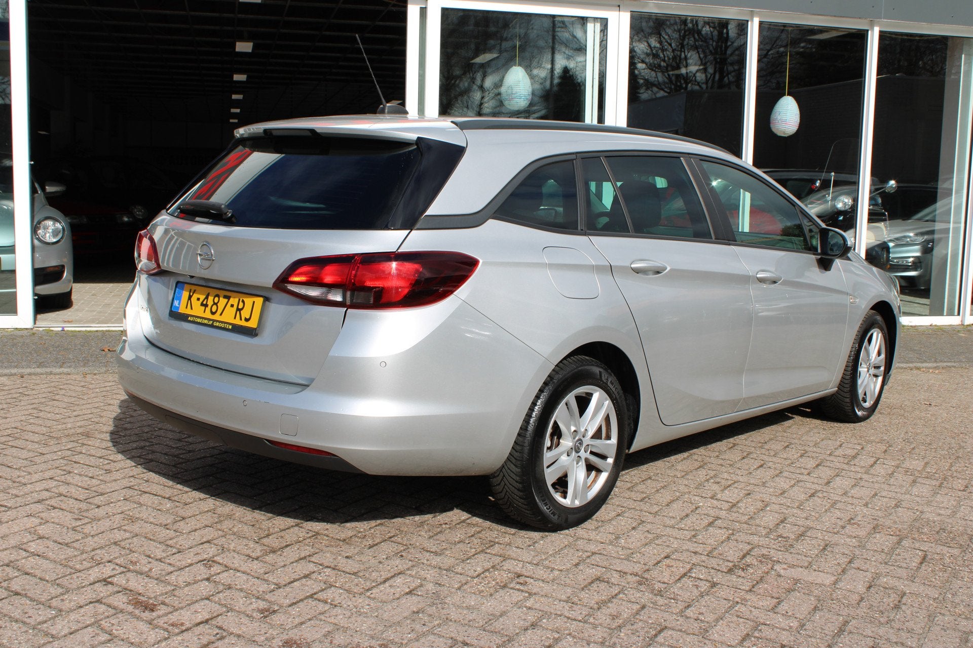 Opel Astra Sports Tourer 1.2 Business Edition (bj 2021), Auto's, Voorwielaandrijving, Dealer onderhouden, Stof, Gebruikt