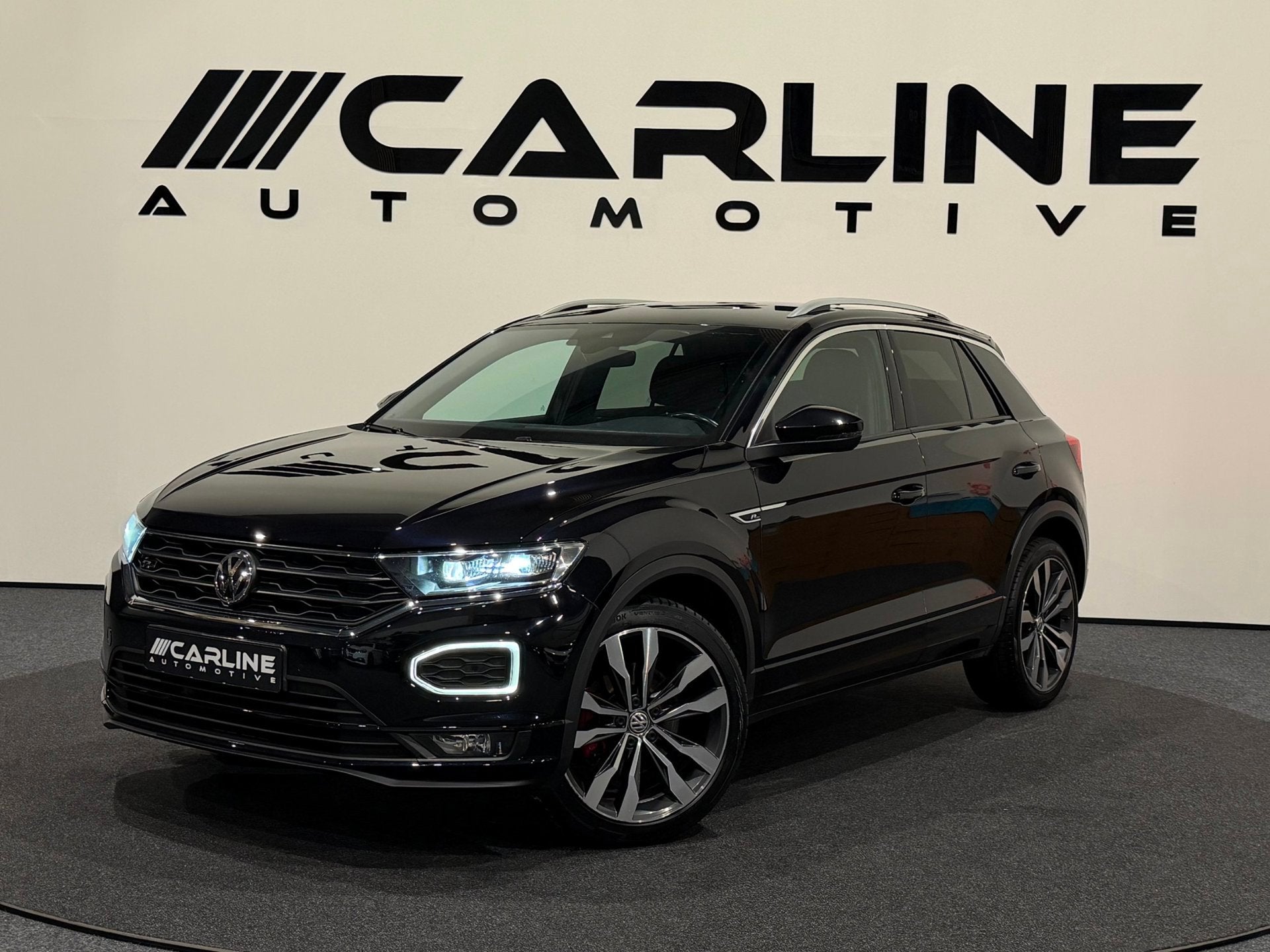 Volkswagen T-Roc 1.5 TSI Sport 2X R-LINE AUT. SFEERVERL. VIR, Auto's, Dealer onderhouden, 4 cilinders, 150 pk, Leder en Stof