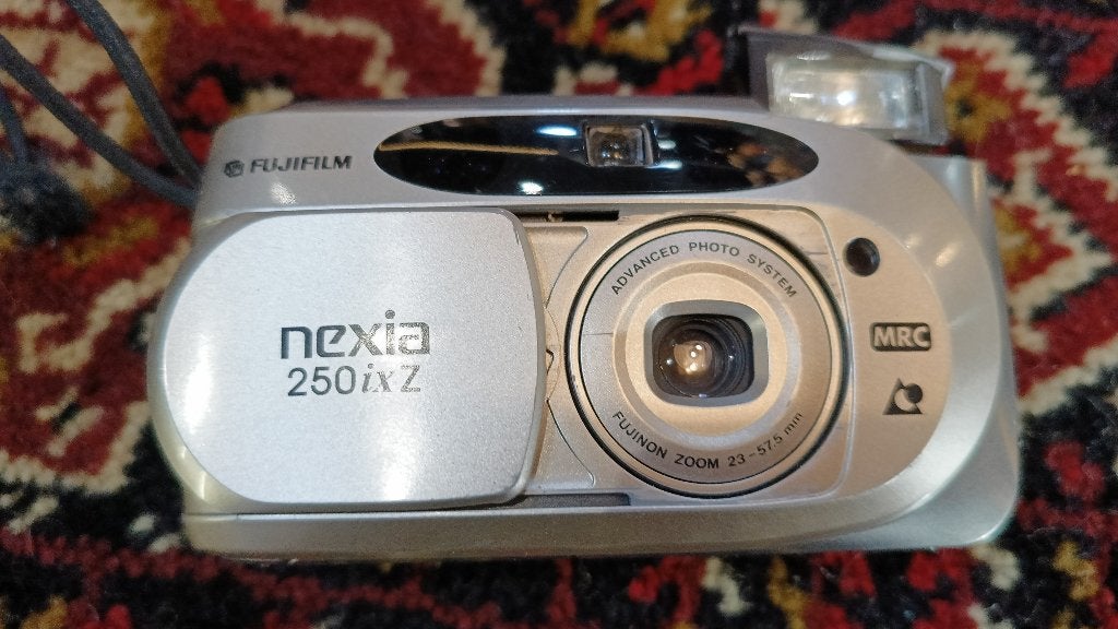 Fujifilm Nexia 250ix Z APS camera met hoesje, Ophalen of Verzenden, Gebruikt, Compact, Fuji