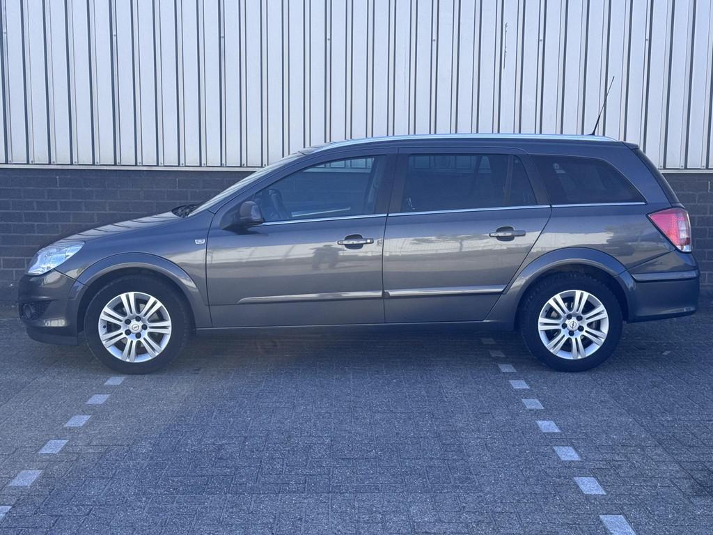 Opel Astra Wagon 1.6 Cosmo Automaat | Leder bekleding | Nieu, Auto's, Opel, Euro 5, Gebruikt, Zwart, 116 pk