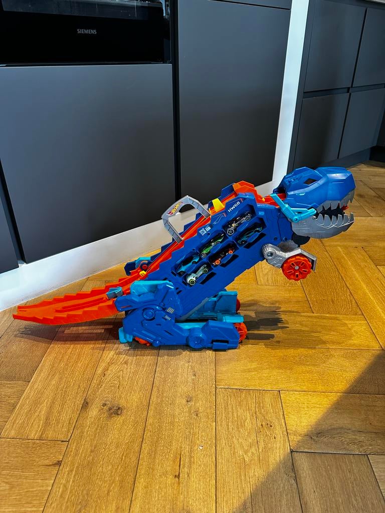 Hot Wheels - City Ultieme Dino Hauler incl. 12 autootjes, Ophalen, Zo goed als nieuw