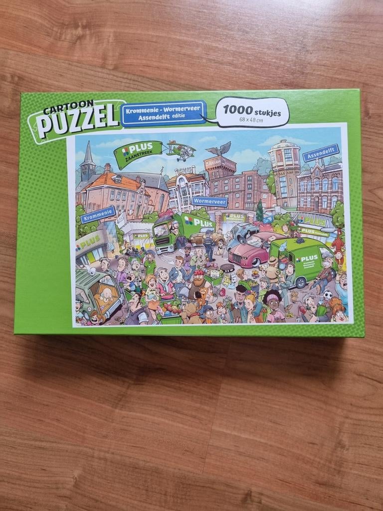 Cartoon Puzzel Krommenie-Wormerveer-Assendelft 1000 stukjes, Ophalen of Verzenden, 500 t/m 1500 stukjes, Zo goed als nieuw, Legpuzzel
