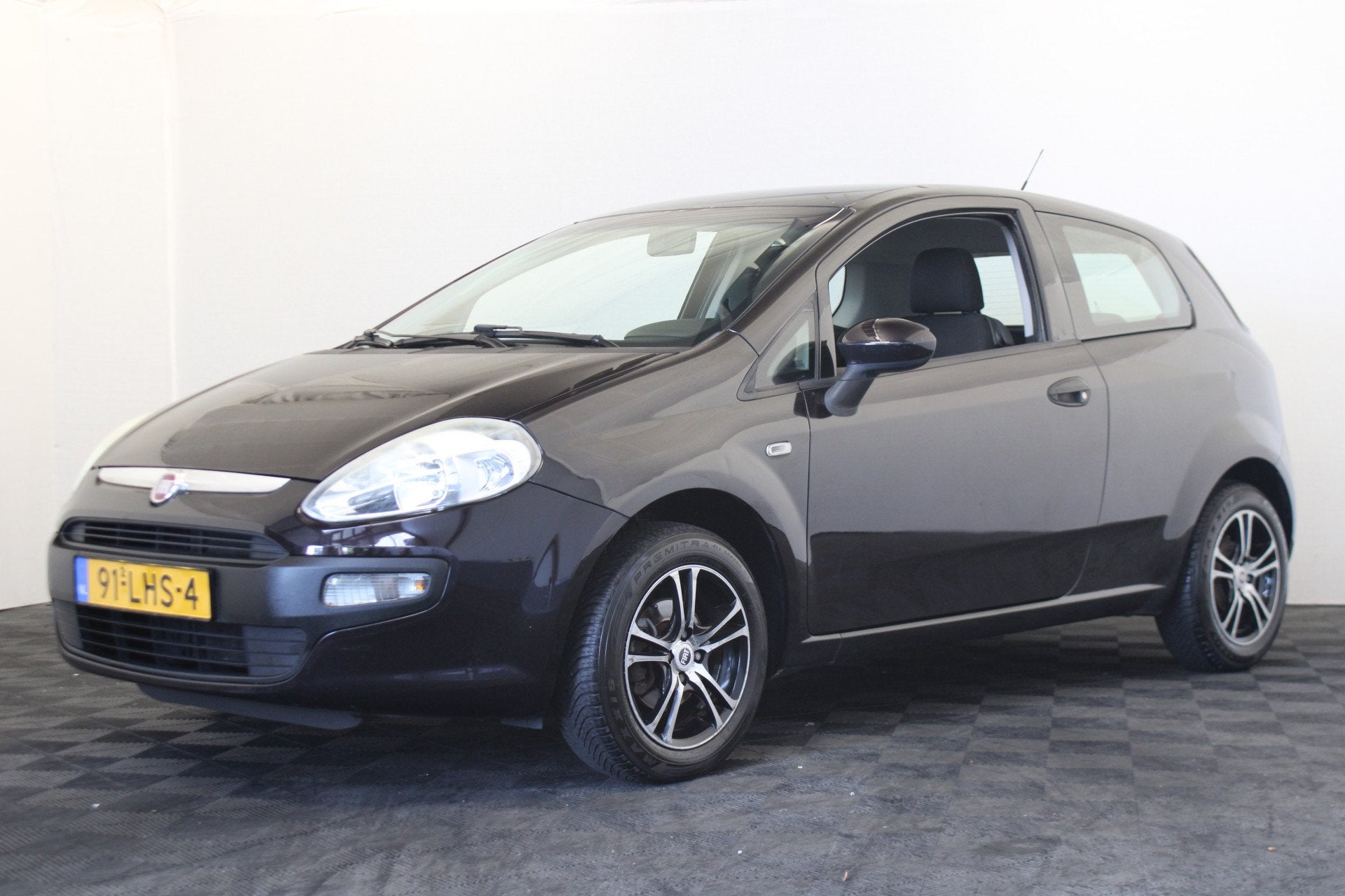 Fiat Punto Evo 1.2 Active (bj 2010), Auto's, Fiat, Voorwielaandrijving, Stof, 4 cilinders, Zwart