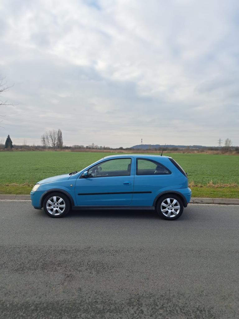 Opel Corsa 1.2 16V Twinport 3D 2006 Blauw, Auto's, Opel, Voorwielaandrijving, 4 cilinders, Blauw, 1229 cc