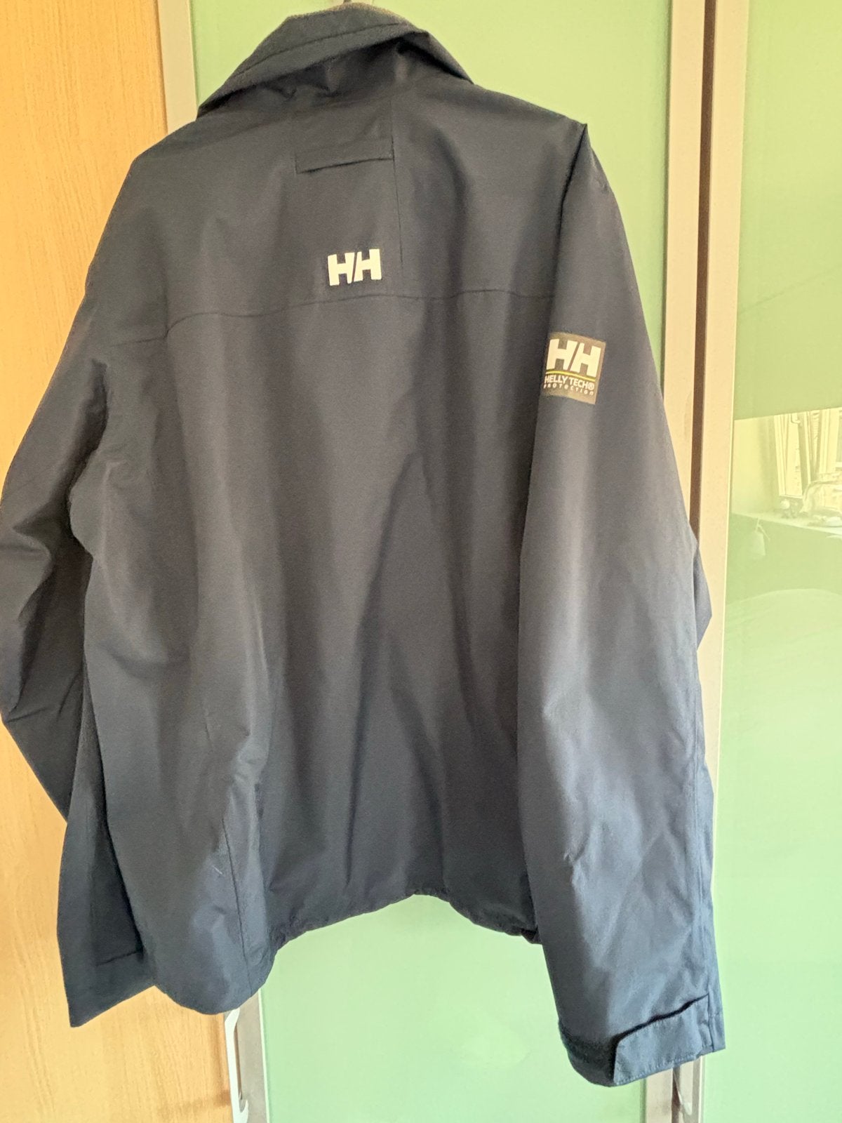 Helly Hansen Heren Jas Maat L/G - Donkerblauw, Ophalen of Verzenden, Zo goed als nieuw, Maat 52/54 (L), Blauw