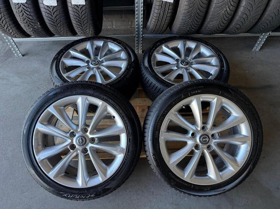 Opel velgen + all season banden 235/45 R18 | incl. montage, Ophalen, 18 inch, Gebruikt, Banden en Velgen