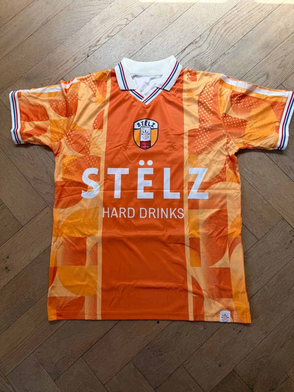 Stëlz shirt oranje maat S-M nieuw, Ophalen of Verzenden, Nieuw, Shirt