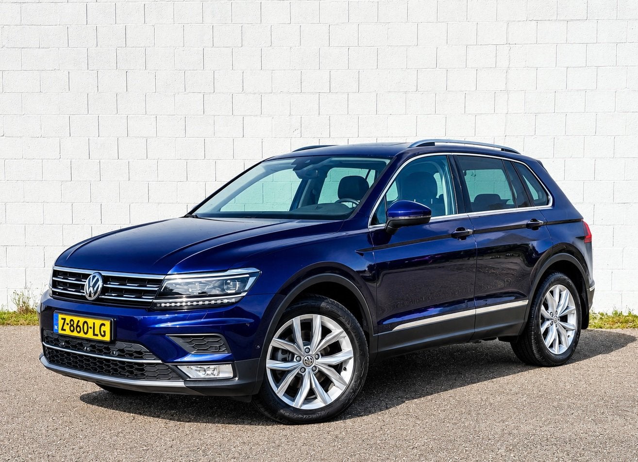 Volkswagen Tiguan 1.4 TSI 150PK 6DSG M16 2016 Blauw, Auto's, 1800 kg, 4 cilinders, Leder, Particulier