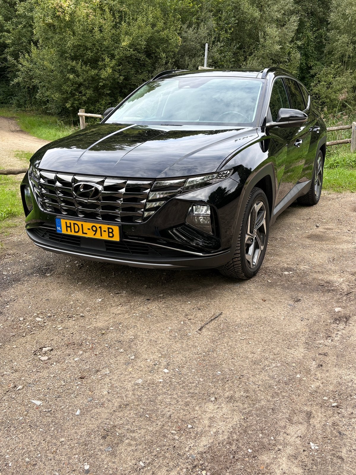 Hyundai Tucson 1.6 T-gdi Phev 265pk AWD Aut. 2022 Zwart, Auto's, Automaat, 1350 kg, Zwart, Plug-in hybride