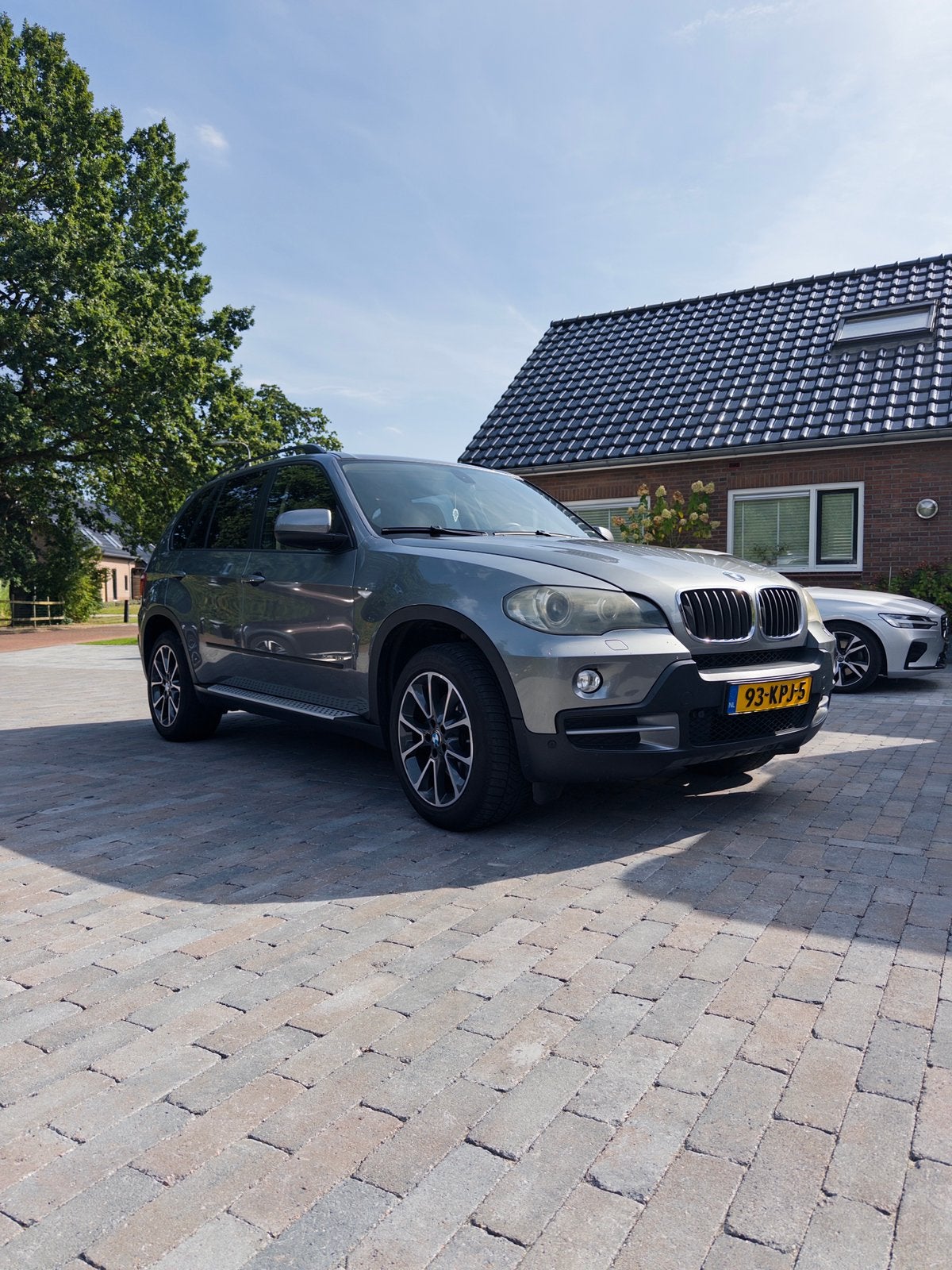BMW X5 3.0 SI AUT 2009 Grijs, Auto's, 2996 cc, 272 pk, 129 €/maand, SUV of Terreinwagen