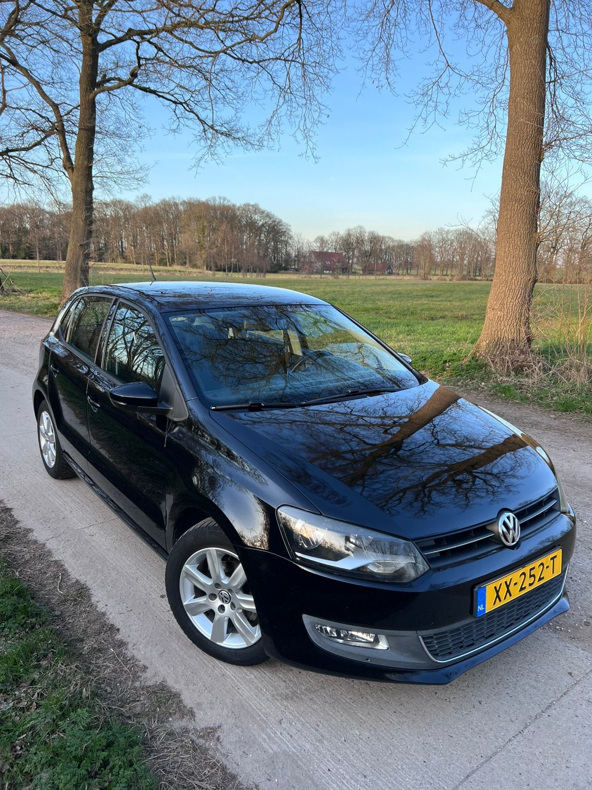 Volkswagen Polo 1.4 16V FSI 63KW 2010 Zwart, Auto's, Voorwielaandrijving, 970 kg, Stof, 40 €/maand
