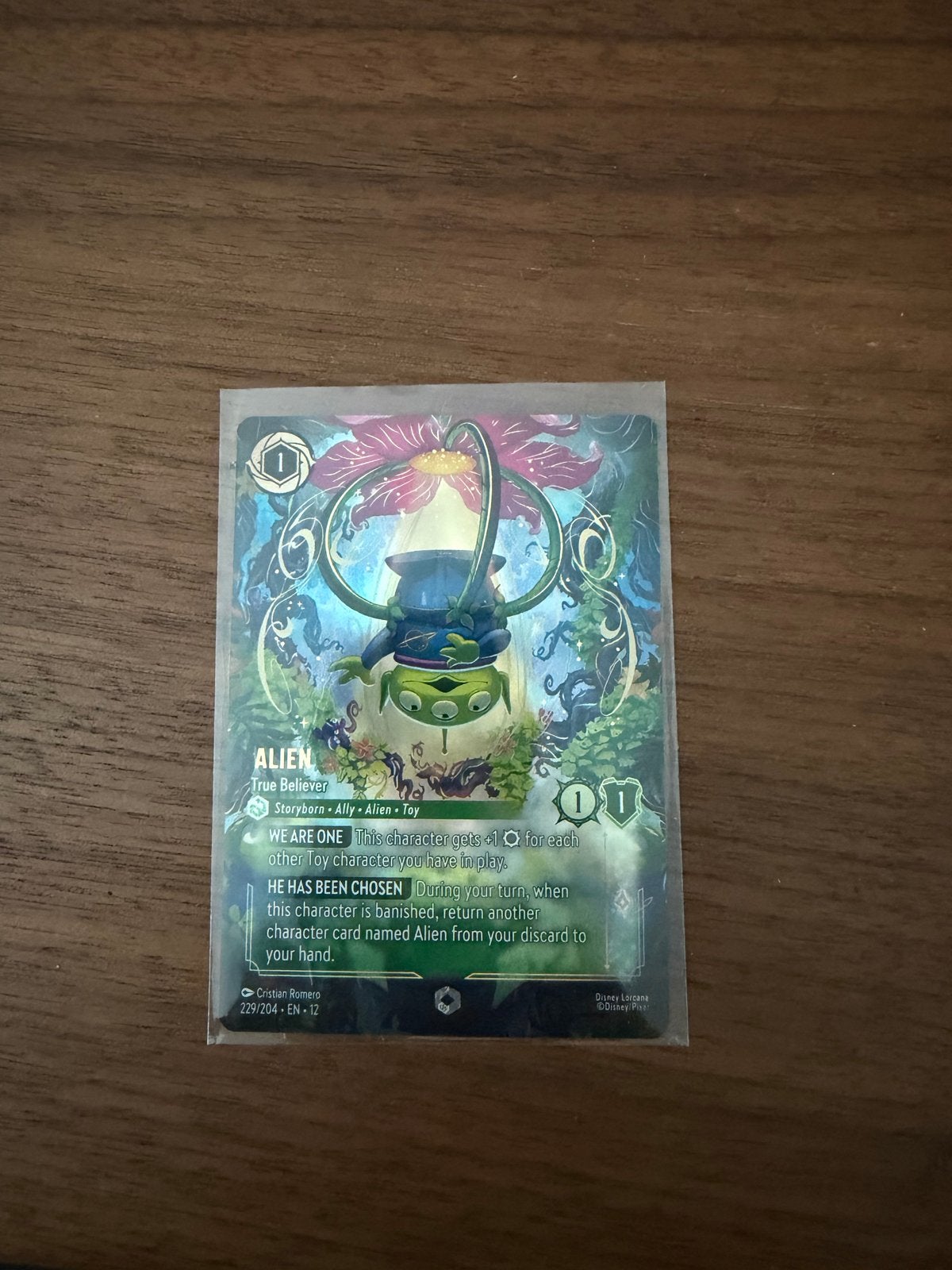 Disney Lorcana enchanted Alien, Hobby en Vrije tijd, Verzamelkaartspellen | Overige, Ophalen of Verzenden, Zo goed als nieuw, Losse kaart