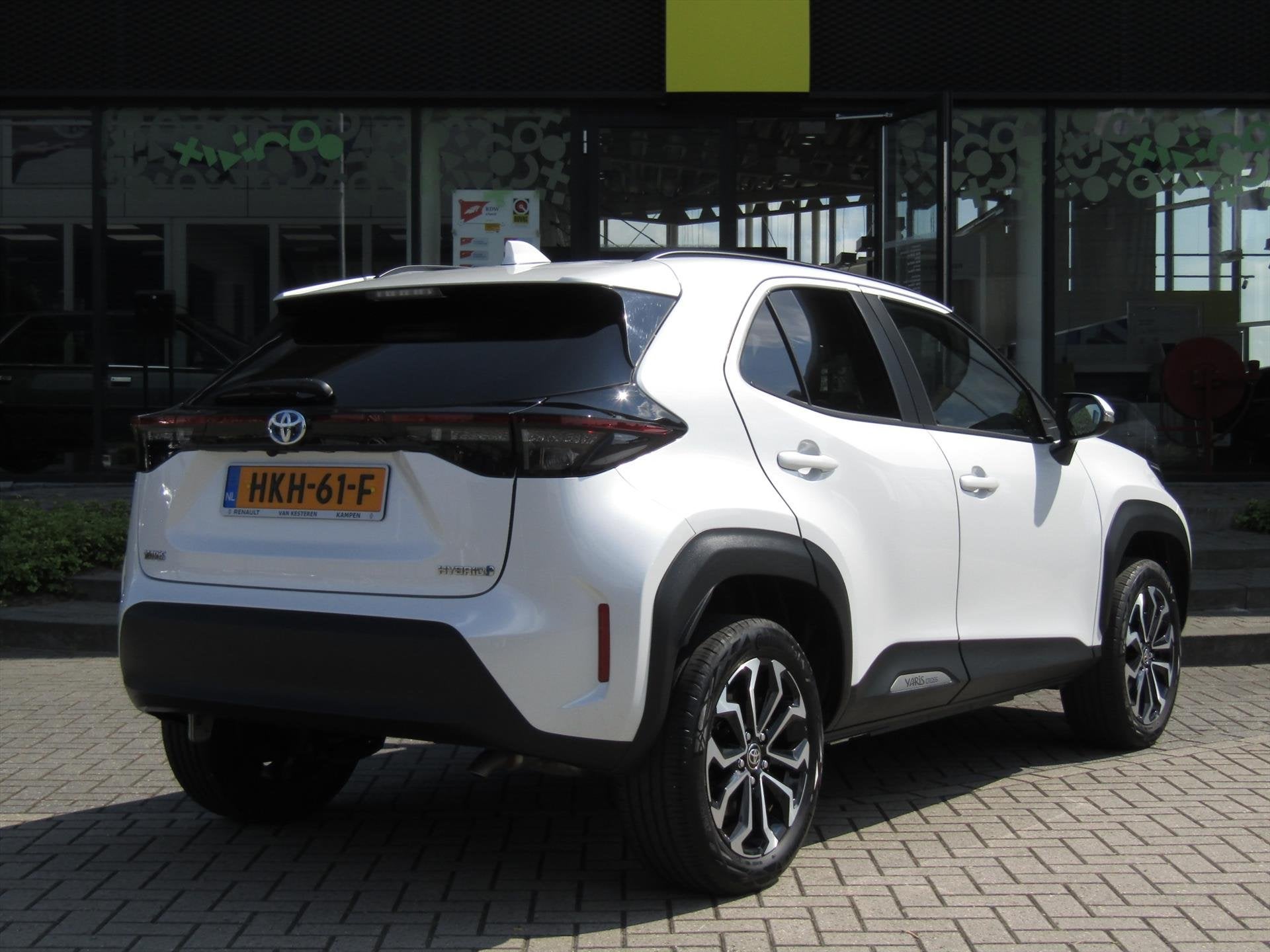 TOYOTA Yaris Cross 1.5 VVT-I Hybrid 116pk CVT Dynamic / Pano, Auto's, Stof, Gebruikt, Wit, 1490 cc