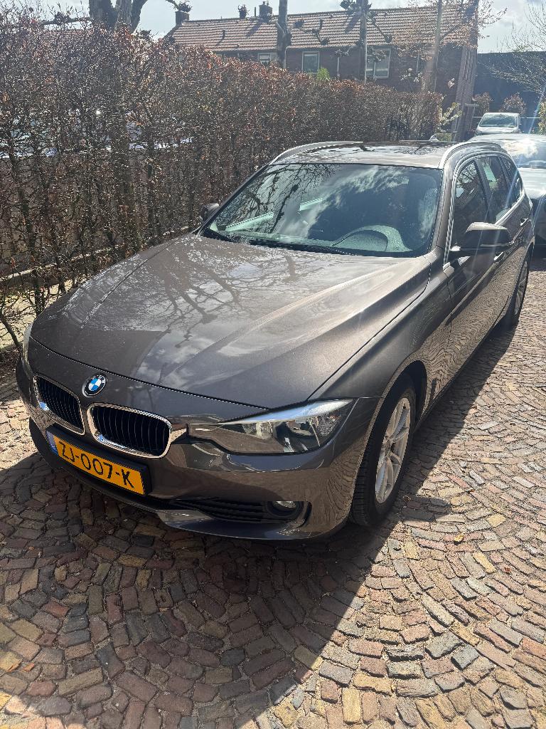 BMW 3-Serie 2.0 318D Touring 2014 Bruin Panoramadak, Auto's, BMW, 745 kg, Achterwielaandrijving, 1995 cc, Zwart