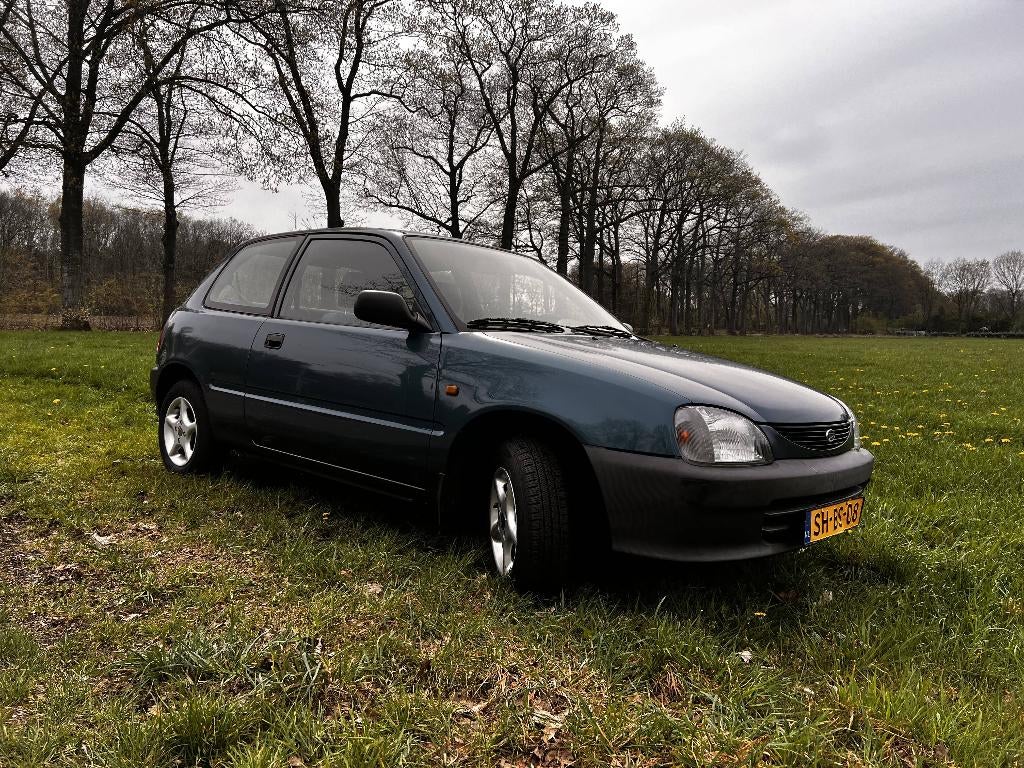 Daihatsu Charade 1.3 I 16V AUT 1997 Blauw, Stof, Origineel Nederlands, Blauw, Onderhoudsboekje