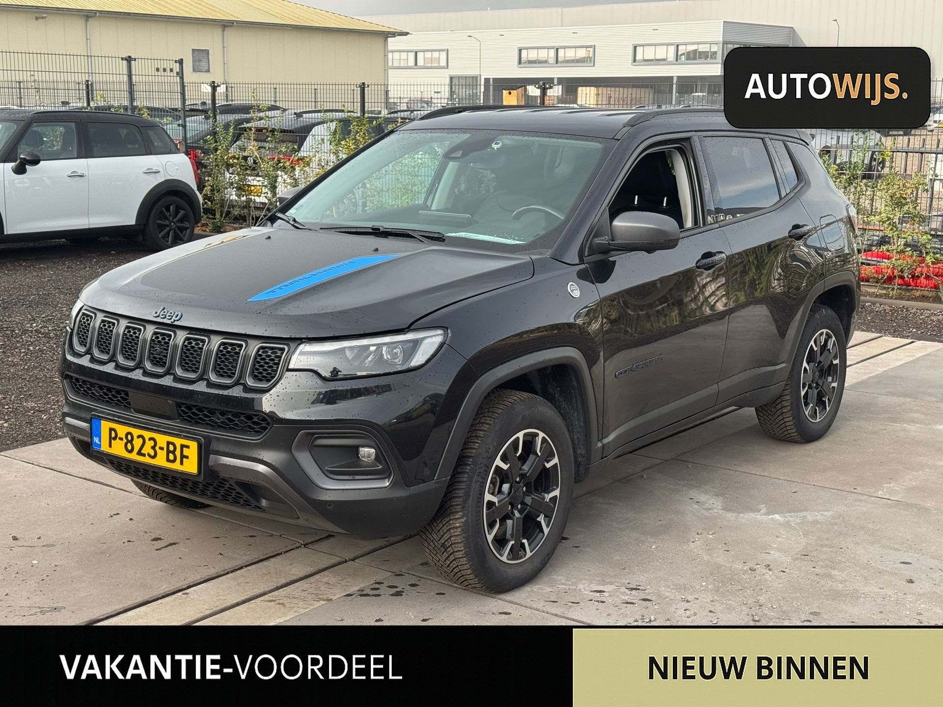 Jeep Compass 4xe 240 Plug-in Hybrid Electric Trailhawk|LEDER, Auto's, Jeep, Automaat, Dealer onderhouden, 4 cilinders, Zwart