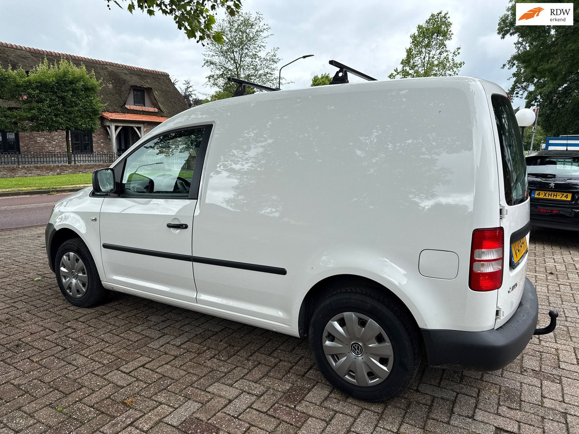 Volkswagen Caddy 1.6 TDI, Auto's, Voorwielaandrijving, Euro 5, Stof, Gebruikt