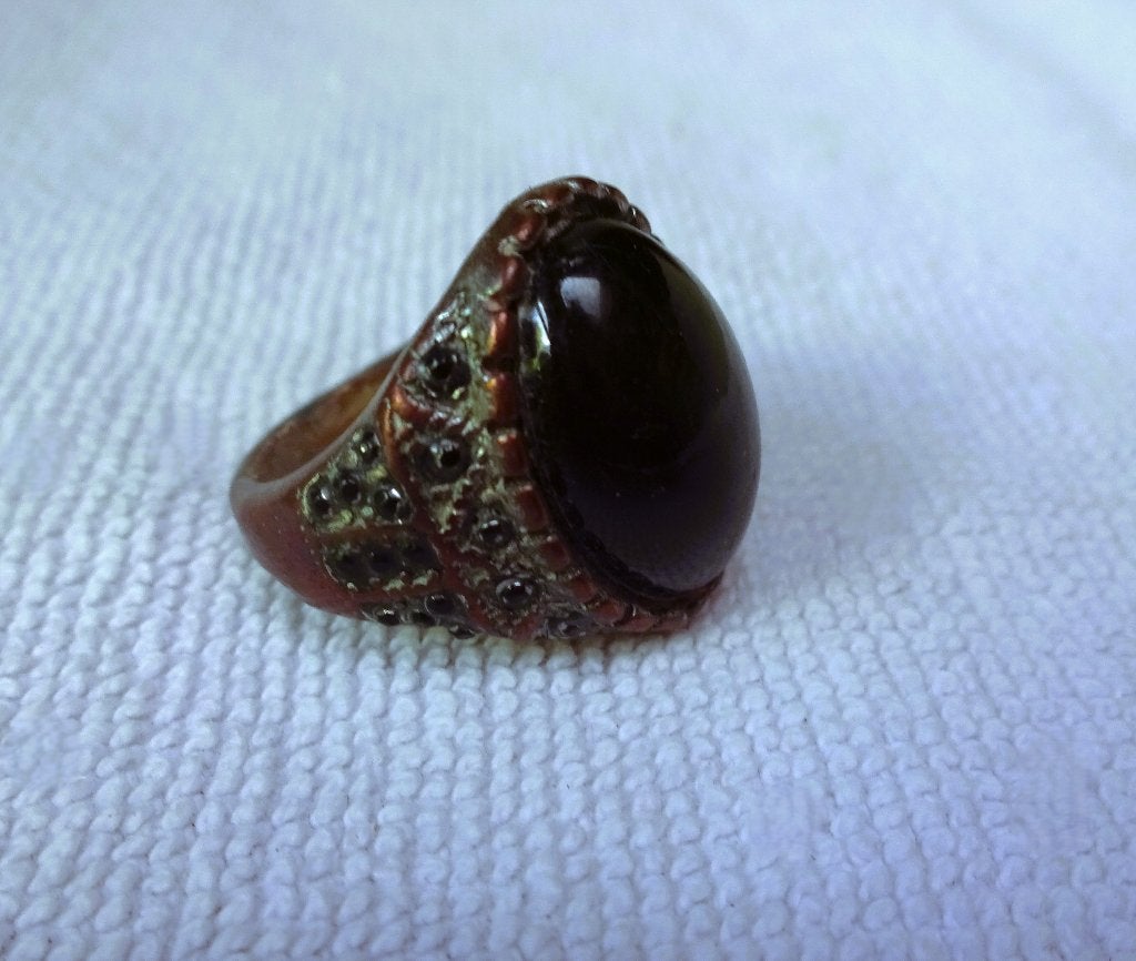 Rood-koperkleurige ring zwart ovaal, Gebruikt, Zwart, 17 tot 18, Dame