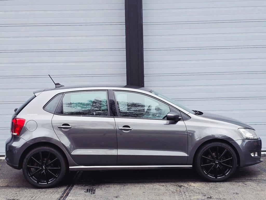 Volkswagen Polo 1.2 TSI Highline, 5 deurs automaat nette sta, Stof, Gebruikt, Zwart, 4 cilinders