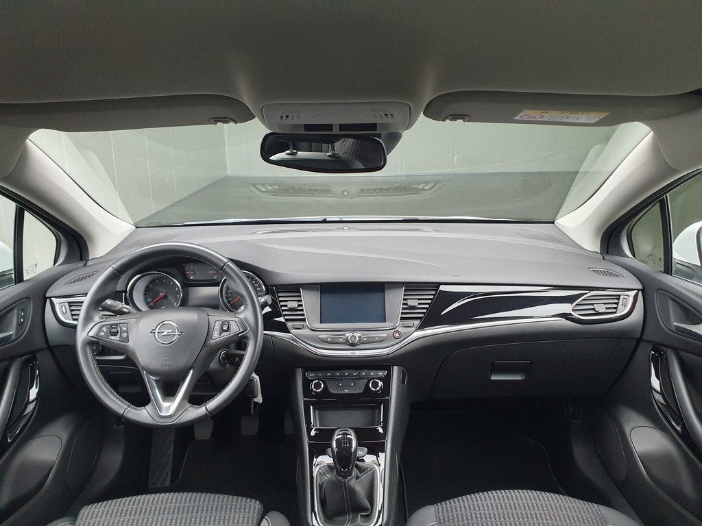 Opel Astra Sports Tourer 1.2 Elegance NAVI/PDC/CRUISE/CLIMA/, Voorwielaandrijving, Gebruikt, Euro 6, Leder en Stof