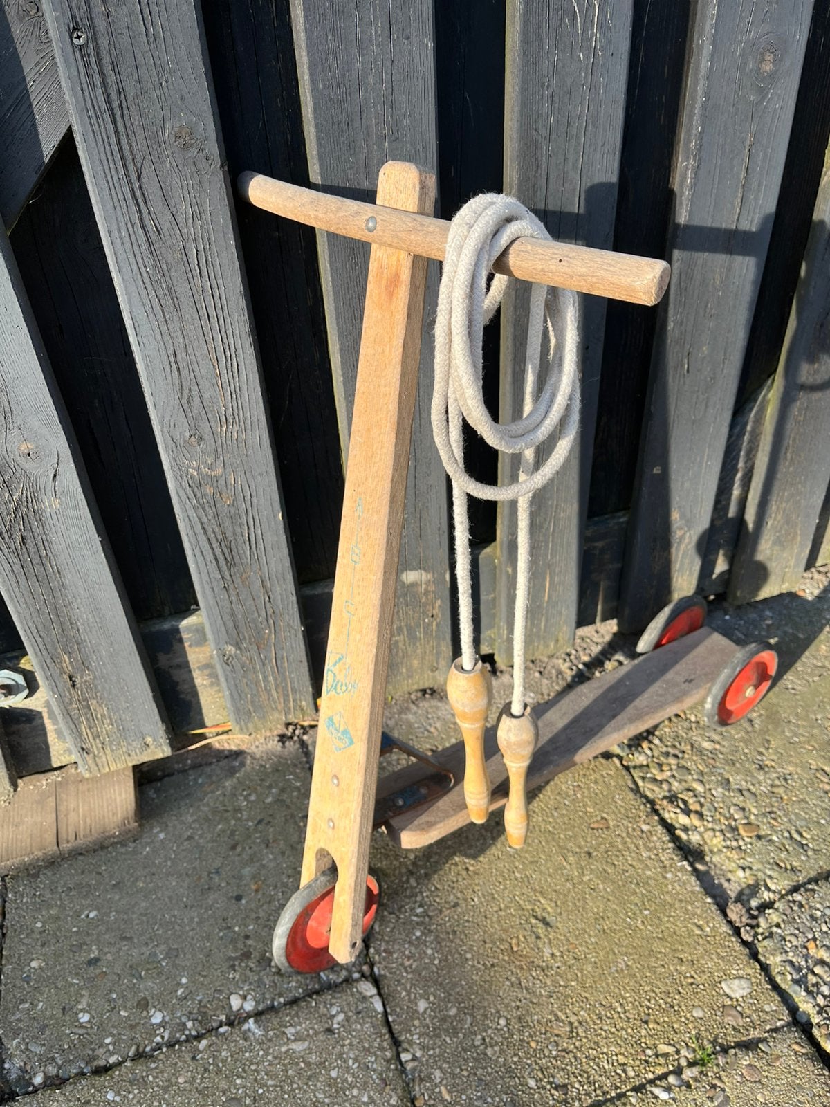 Houten step, Springtouw met houten klosjes, Ophalen