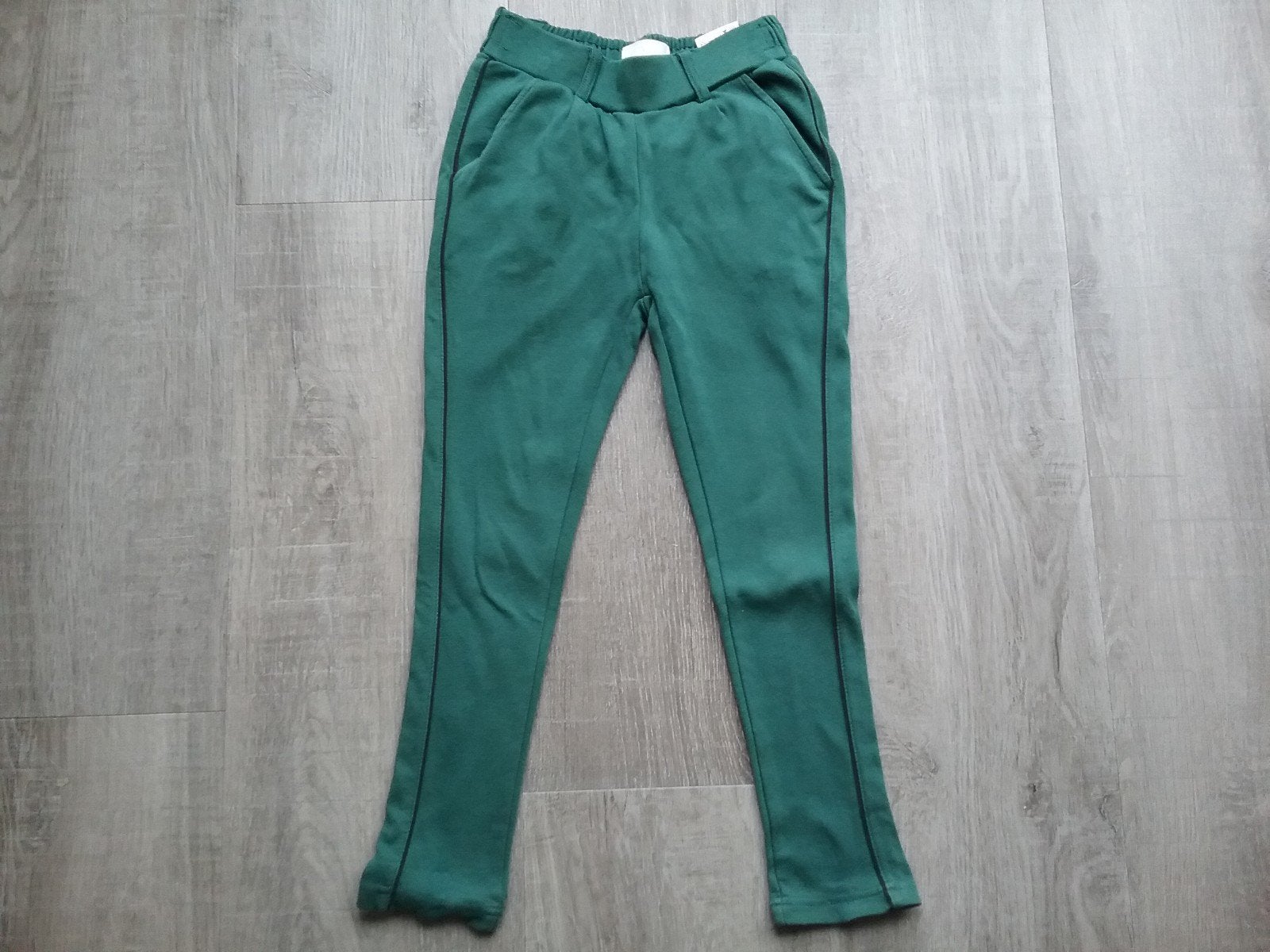 Groene d zine strekking broek128/134, Kinderen en Baby's, Kinderkleding | Maat 128, Ophalen of Verzenden, Zo goed als nieuw