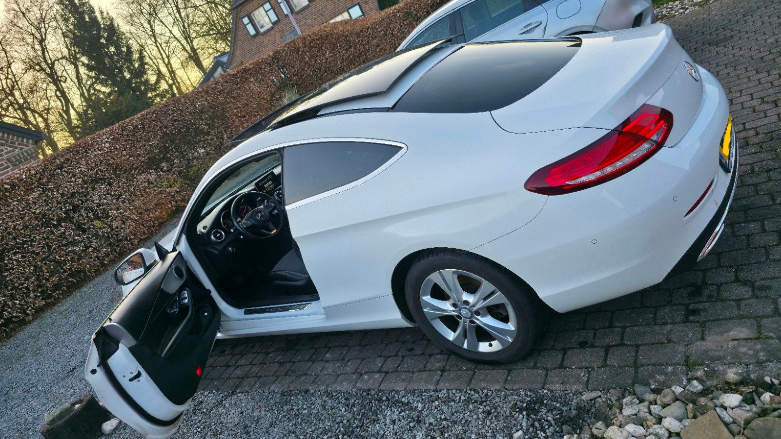 Mercedes-Benz C-Klasse 1.6 C180 BE Coupe 2016 Wit, Auto's, Mercedes-Benz, Achterwielaandrijving, 4 stoelen, Leder en Stof, Wit