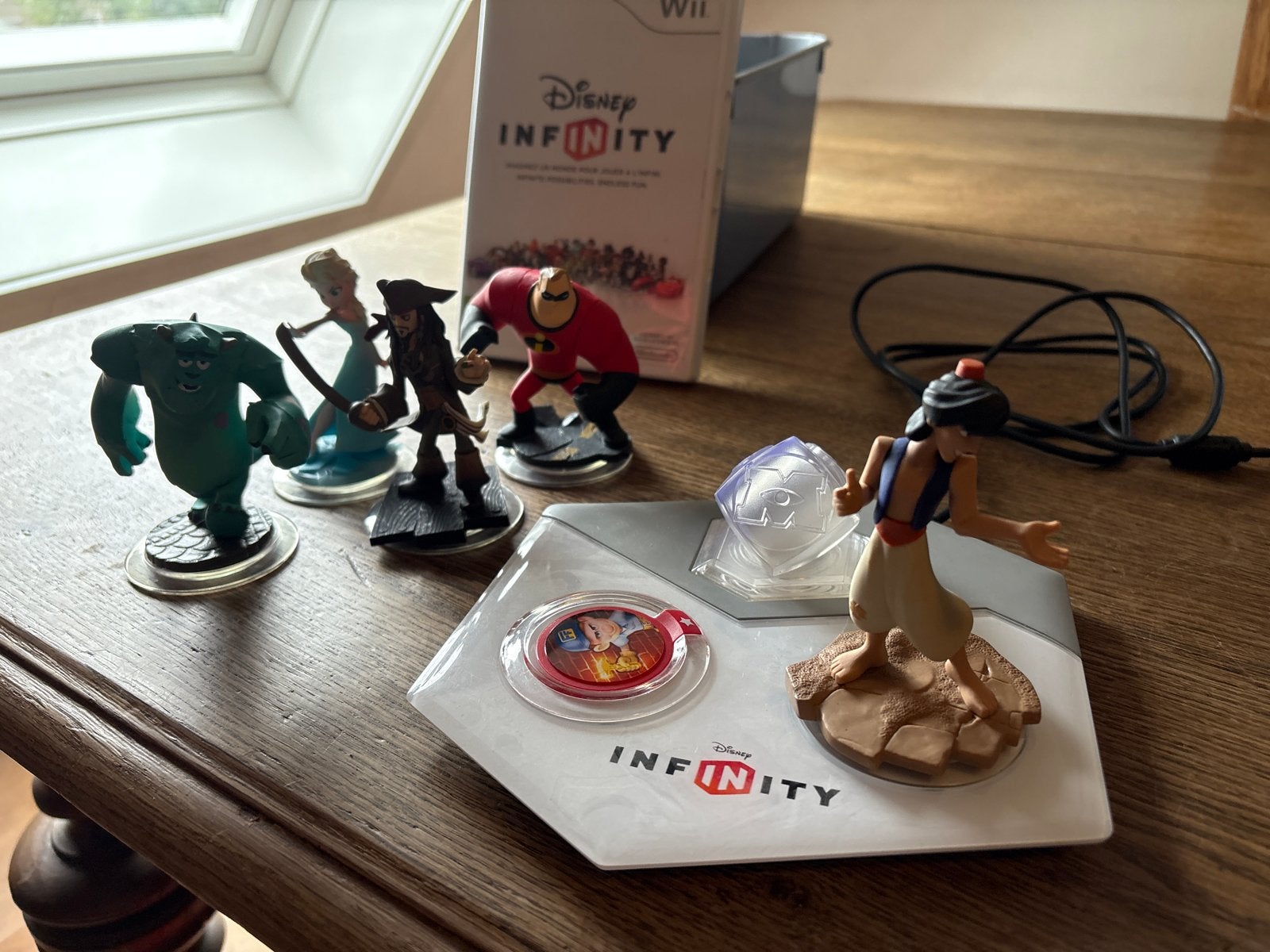 Disney Infinity Starter Pack Wii met 5 figuren, Ophalen of Verzenden, Gebruikt