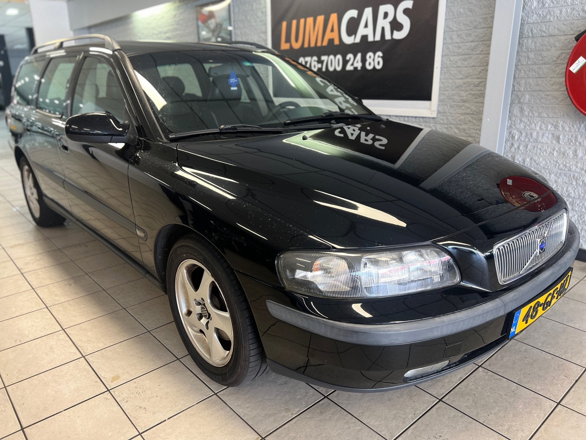 Volvo V70 2.4 | Nieuwe APK | Cruise | Airco | Trekhaak |, Auto's, Voorwielaandrijving, 1505 kg, Leder en Stof, Zwart